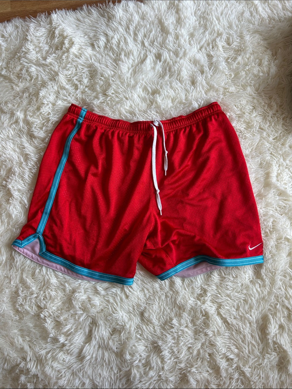 Nike Red Woman’s Athletic Shorts with Teal Trim